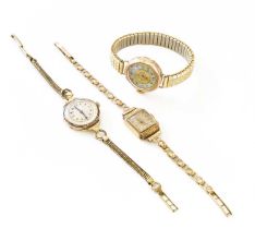 An 18 carat gold lady's wristwatch with attached 9 carat gold bracelet, and two lady's 9 carat