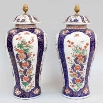 A Pair of Japanese Imari Porcelain Vases and Covers, early 20th century, with panels of birds and