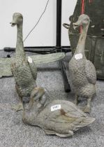 Three Small Cast Metal Garden Statues, formed as ducks, tallest 38cm Seated duck with a repair to