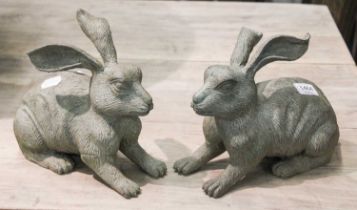 A Pair of Cast Metal and Patinated Small Garden Statues, formed as crouching leverets (2)