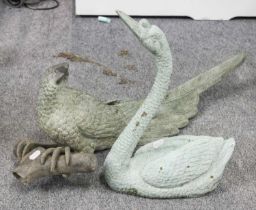 A Cast Metal Garden Statue, formed as a swan and with verdigris patination, 50cm high; together with