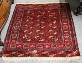 Early 20th Century Tekke Marriage Rug, the field with three columns of guls enclosed by borders of