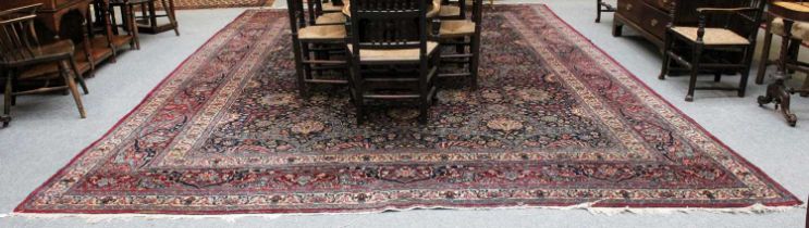 Tabriz Carpet, the indigo field with an allover lattice design of large flowerheads and vines