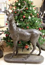 A Cast Metal Garden Statue, formed as a stag, standing four-square on oval plinth, 148cm high
