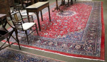 Large Saroukh Carpet, the blood red field of palemettes and scrolling vines centred by a