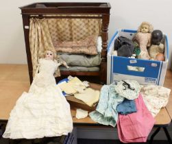 Dolls and Accessories, comprising a Victorian mahogany dolls four poster bed, various dolls clothing