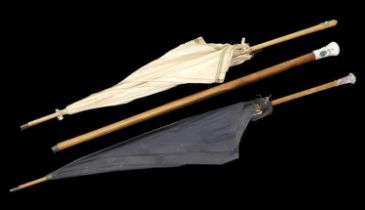 Early 20th Century S Fox and Co Black Silk Mounted Umbrella with a wooden handle and an amethyst