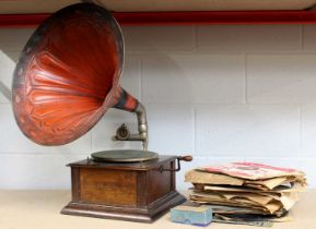 A Peerless Gramophone, with red toleware horn Dates to the 1930's, motor runs smoothly when wound