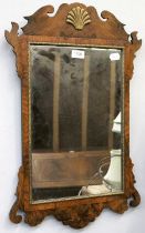 A George III Style Parcel Gilt Walnut Fretwork Mirror, 42cm by 65cm