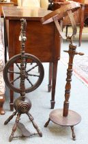 A 19th Century Black Forest Spinning Wheel, with a carved figure to the base, together with a 19th