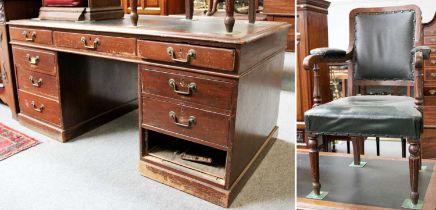A Victorian Mahogany Desk, 168cm by 91cm by 79cm; together with A Studded and Leather Open Armchair,