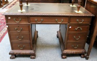 A 20th Century Oak Lined Mahogany Pedestal Desk on ball and claw, 123cm by 68cm by 77cm