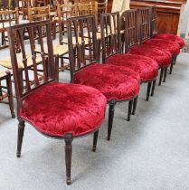 A Set of Six Late George III Mahogany Dining Chairs, on fluted tapering legs Three chairs very