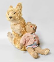 Mid 20th Century Yellow Plush Seated Fox with a swivelling head, glass eyes and stitched nose, 33cm,