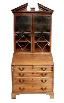 A George III Mahogany Bureau Bookcase, broken swan neck pediment, 107cm by 55cm by 234cm