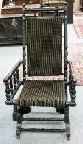 A 19th Century Ebonised American Style Rocking Chair