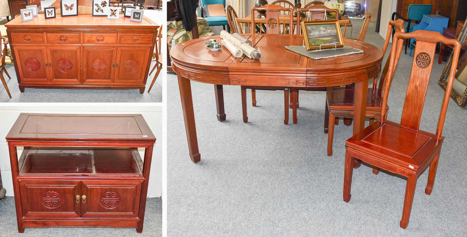 A 20th Century Chinese Hardwood Dining Suite Comprising; an extending dining table, 152cm by 107cm