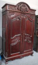 A Reproduction French Stained Hardwood Carved Armoire, 130cm by 57cm 231cm