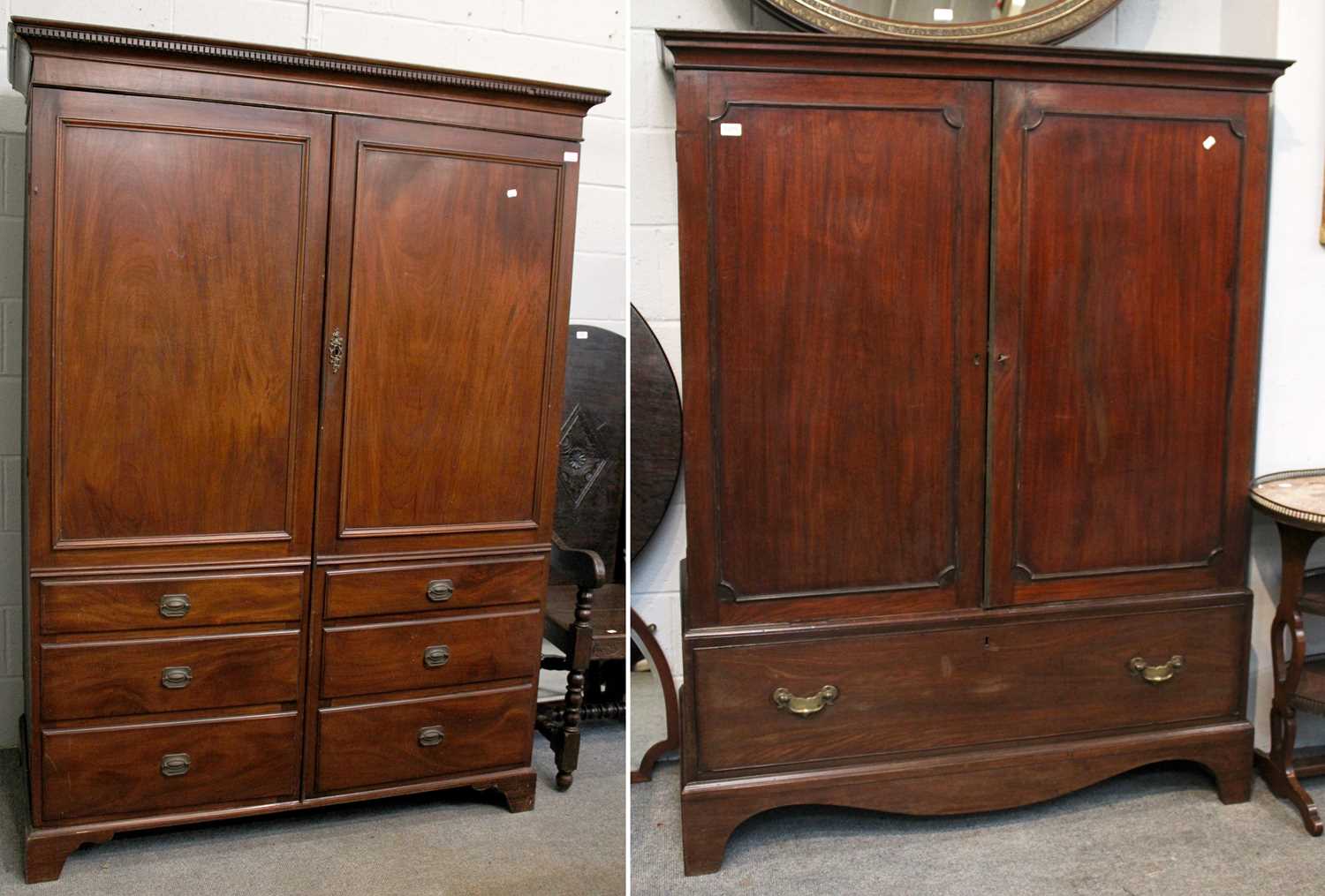 A 19th Century Mahogany Two Door Dwarf Wardrobe, 132cm by 53cm by 174cm; together with another two