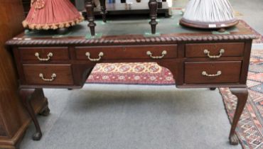 An 18th Century Style Mahogany Inset Writing Desk, on claw and ball feet, 144cm by 81cm by 76cm