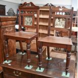 Two Similar Late Victorian Mahogany Hall Chairs, the back rest set with Minton tiles, titled ''The