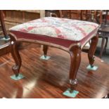 A Victorian Carved Mahogany Stool, with beadwork and needlepoint seat, raised on cabriole