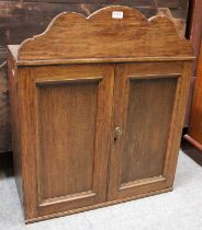 An Oak Country House Office Letter Box, circa 1900-20, with arched pediment fitted with pigeon holes