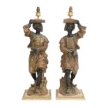 A Pair of Gilt and Painted Composition Figural Lamp Bases, in the form of Blackamoors, 85cm