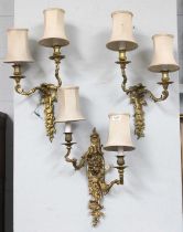 A Pair of Gilt Bronze Twin Light Wall Sconces, cast with flowers and scrolling acanthus leaves, each