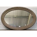 A Rosewood Framed Parcel Gilt Oval Mirror, 108cm by 78cm; together with a small mahogany mirror (2)