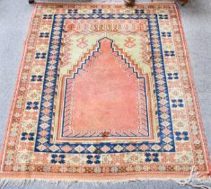 Turkish Prayer Rug, the terracotta field beneath a stepped Mihrab enclosed by pale lemon borders