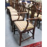 A Set of Seven George III Mahogany Dining Chairs, including one carver