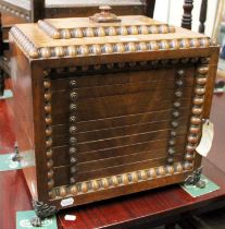 A William IV Figured Mahogany Table Top Collectors Cabinet, gadrooned and on metal paw feet, 45cm by