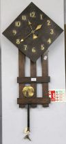 An Arts and Crafts Oak and Brass Mounted Striking Wall Clock, 80cm high