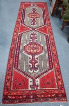 Sarab Runner, the crimson field with two lozenges framed by spandrels and borders of meandering