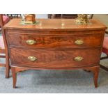 A Georgian Mahogany Bow Front Two Drawer Chest, 114cm by 52cm by 85cm; together with a mid 20th