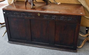 An 18th Century Oak Three Panel Coffer, with lunette carved frieze, 134cm by 56cm by 68cm