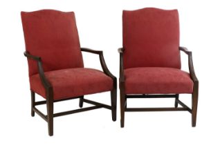 A Pair of 19th Century Mahogany Gainsbrough Chairs, One chair with a repaired arm, both with some