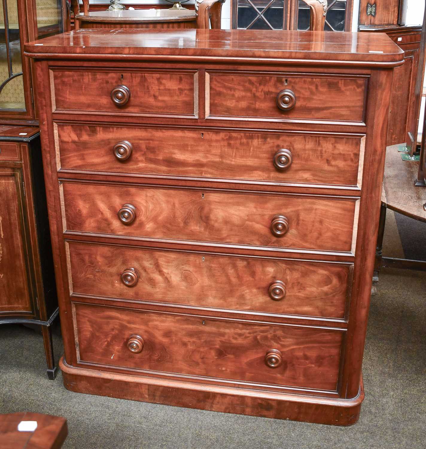 A Victorian Mahogany Five Height Chest of Drawers, with moulded beading and turned drawer pulls,