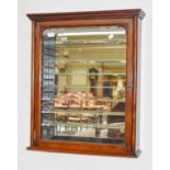 A Mahogany Mirrored Hanging Display Cabinet, with seven adjustable glass shelves, 60.5cm by 15cm