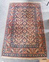 Nejafabad Rug, the ivory field with a one-way design of flowering plants enclosed by meandering vine