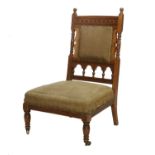 A Late 19th Century Mahogany Nursing Chair, the leg stamped Gillow & Co, Lancaster