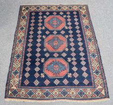 Yerevan Rug, the inidigo field centred by three octagons enclosed by ivory borders of stepped