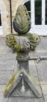 A Weathered Carved Stone Finial, the acanthus top on a triangular base, 150cm high