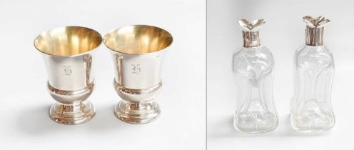 A Pair of Victorian Silver Mounted Decanters and a Pair of American Silver Beakers, The Decanters