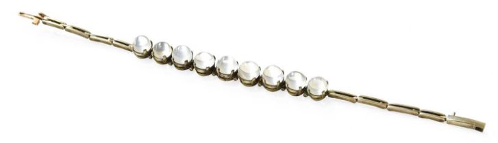 A Moonstone Bracelet, nine round cabochon moonstones in white claw settings, to a rectangular box