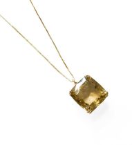 A Smoky Quartz Pendant on Chain, the cushion cut smoky quartz in a yellow double claw setting, on