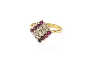 An 18 Carat Gold Ruby and Diamond Cluster Ring, the square plaque comprising of two rows of round