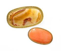 Two Banded Agate Brooches, the oval plaques in yellow frames, measure 5.4cm by 3.5cm and 8.1cm by