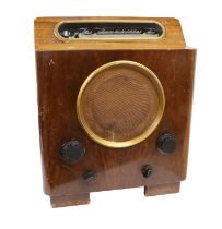 A Second World War Period Murphy Home Radio Type A72, in a walnut case with bakelite knobs In part